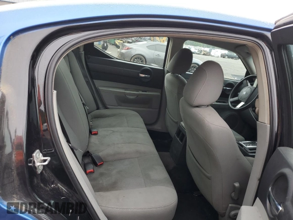 2007 Dodge Charger SXT z VIN 2B3LK43G97H797976, wystawiony jako Copart lot #69449804 z przebiegiem 245 852 mil mil oraz Szkoda całkowita • Salvage title. Historia ofert i sprzedaży dostępna na DreamBid. Obrazek 10.