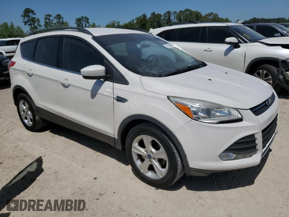 2015 Ford Escape SE with VIN 1FMCU0GXXFUB61487, listed as a Copart auction lot 52116665 with 115,921 mi miles and Salvage Title. Bid and sale history available at DreamBid. Image 4.