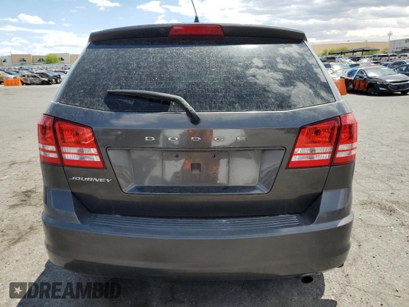 2014 Dodge Journey American Value Pkg with VIN 3C4PDCAB8ET256983, listed as a Copart auction lot 54976545 with 184,764 mi miles and Clean Title. Bid and sale history available at carsss.com. Image 6.