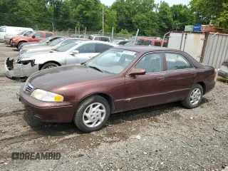 2000 Mazda 626 LX z VIN 1YVGF22C4Y5112874, wystawiony jako Copart lot #58952175 z przebiegiem 100 070 mil mil oraz Szkoda całkowita • Salvage title. Historia ofert i sprzedaży dostępna na DreamBid. Obrazek 1.