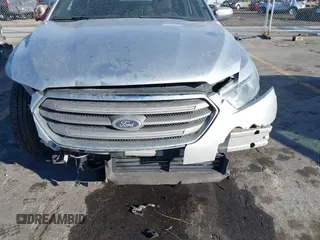 2013 Ford Taurus SEL with VIN 1FAHP2E83DG224780, listed as a IAAI auction lot 41675601 with 166,977 mi miles. Bid and sale history available at carsss.com. Image 6.