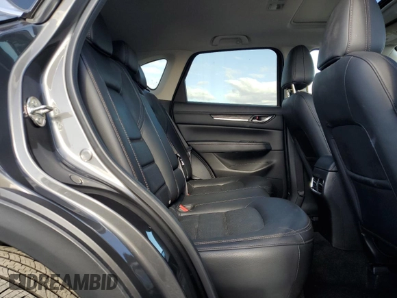 2018 Mazda CX-5 Grand Touring with VIN JM3KFADM8J1330353, listed as a Copart auction lot 54752325 with 96,577 mi miles and Salvage Title. Bid and sale history available at DreamBid. Image 11.