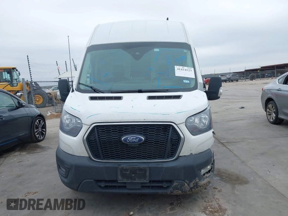 2021 Ford Transit Cargo with VIN 1FTBR1X82MKA98734, listed as a IAAI auction lot 41424123 with 84,453 mi miles and . Bid and sale history available at DreamBid. Image 12.