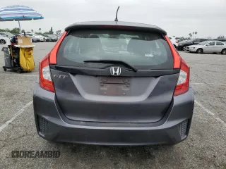 2015 Honda Fit LX z VIN 3HGGK5H58FM785137, wystawiony jako Copart lot #59013315 z przebiegiem 84 592 mil mil oraz Szkoda całkowita • Salvage title. Historia ofert i sprzedaży dostępna na DreamBid. Obrazek 6.