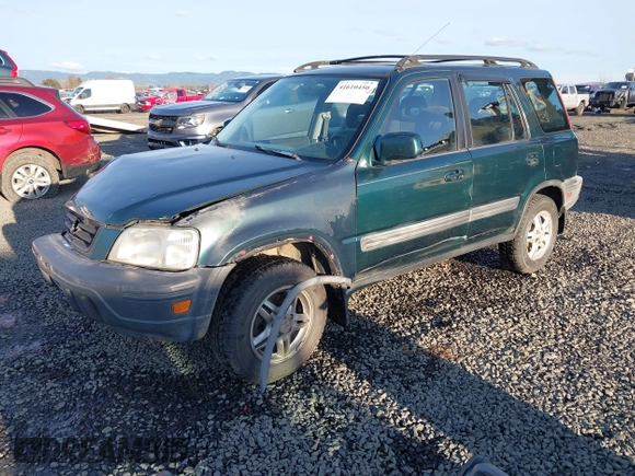 2000 Honda CR-V EX with VIN JHLRD1864YC025085, listed as a IAAI auction lot 41610450 with 249,573 mi miles. Bid and sale history available at carsss.com. Image 16.