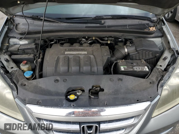 2007 Honda Odyssey EX-L z VIN 5FNRL38637B004323, wystawiony jako Copart lot #59626045 z przebiegiem 178 069 mil mil oraz Szkoda całkowita • Salvage title. Historia ofert i sprzedaży dostępna na DreamBid. Obrazek 12.