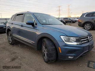2020 Volkswagen Tiguan SE with VIN 3VV2B7AXXLM181344, listed as a Copart auction lot 87182794 with 62,145 mi miles and Salvage Title. Bid and sale history available at carsss.com. Image 4.