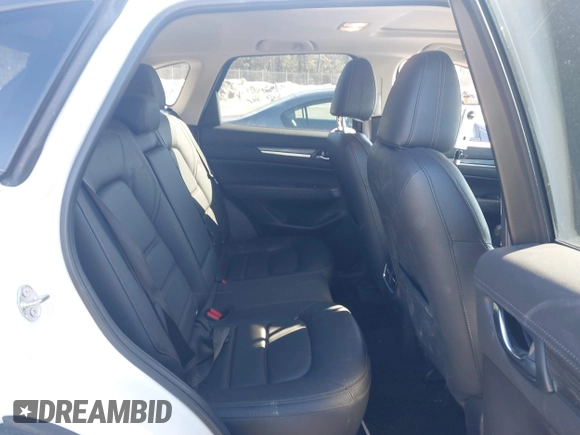 2019 Mazda CX-5 Grand Touring with VIN JM3KFBDM2K0672720, listed as a IAAI auction lot 41751196 with 51,632 mi miles and . Bid and sale history available at carsss.com. Image 8.