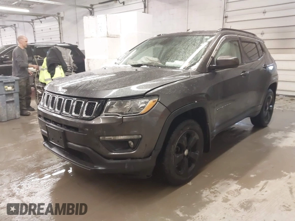 2018 Jeep Compass Altitude with VIN 3C4NJDBB6JT187581, listed as a IAAI auction lot 41542689 with 126,147 mi miles and . Bid and sale history available at carsss.com. Image 2.