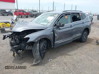 2021 Volkswagen Tiguan SE z VIN 3VV3B7AX8MM159316, wystawiony jako IAAI lot #42525546 z przebiegiem 70 141 mil mil oraz . Historia ofert i sprzedaży dostępna na DreamBid. Obrazek 19.