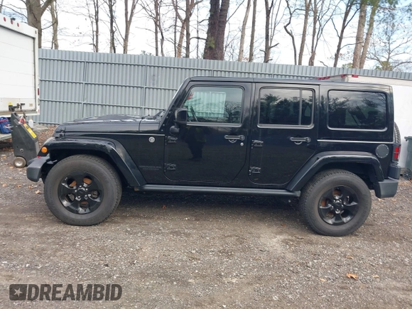 2015 Jeep Wrangler Unlimited Sahara with VIN 1C4HJWEG0FL661723, listed as a IAAI auction lot 41998393 with 89,077 mi miles. Bid and sale history available at carsss.com. Image 14.