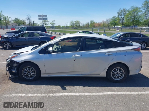 2018 Toyota Prius Two with VIN JTDKBRFU6J3603990, listed as a IAAI auction lot 42151090 with 71,388 mi miles and . Bid and sale history available at DreamBid. Image 14.