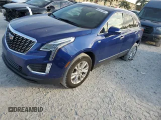 2023 Cadillac XT5 FWD Luxury z VIN 1GYKNAR47PZ165114, wystawiony jako Copart lot #83427894 z przebiegiem 21 937 mil mil oraz Szkoda całkowita • Salvage title. Historia ofert i sprzedaży dostępna na DreamBid. Obrazek 1.