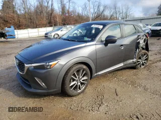 2016 Mazda CX-3 Grand Touring z VIN JM1DKBD75G0109742, wystawiony jako Copart lot #70424582 z przebiegiem 62 225 mil mil oraz . Historia ofert i sprzedaży dostępna na DreamBid. Obrazek 1.