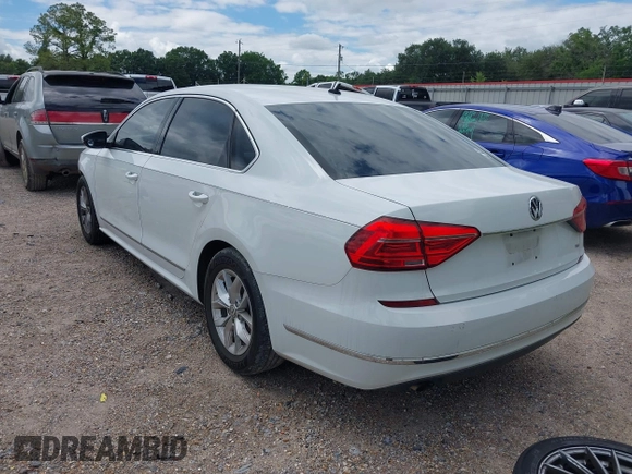 2016 Volkswagen Passat S with VIN 1VWAT7A32GC031172, listed as a IAAI auction lot 42231645 with 112,974 mi miles and . Bid and sale history available at DreamBid. Image 3.