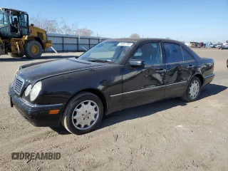 1998 Mercedes-Benz E-Class with VIN WDBJF65F4WA646422, listed as a Copart auction lot 88982785 with 281,524 mi miles and Salvage Title. Bid and sale history available at carsss.com. Image 1.