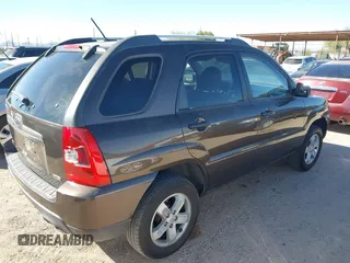 2010 Kia Sportage LX with VIN KNDKGCA32A7666414, listed as a IAAI auction lot 41598263 with 166,882 mi miles and . Bid and sale history available at carsss.com. Image 4.