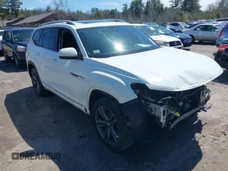 2022 Volkswagen Atlas SEL R-Line z VIN 1V2AR2CA3NC501396, wystawiony jako IAAI lot #42002865 z przebiegiem 60 131 mil mil oraz . Historia ofert i sprzedaży dostępna na DreamBid. Obrazek 1.