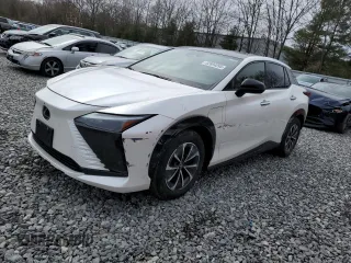 2024 Lexus RZ 450e Premium z VIN JTJAAAAB6RA024377, wystawiony jako Copart lot #52694095 z przebiegiem 20 872 mil mil oraz Szkoda całkowita • Salvage title. Historia ofert i sprzedaży dostępna na DreamBid. Obrazek 1.