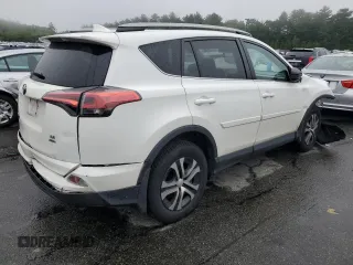 2018 Toyota RAV4 LE with VIN 2T3BFREV2JW853108, listed as a Copart auction lot 61245795 with 174,196 mi miles and Salvage title. Bid and sale history available at DreamBid. Image 3.