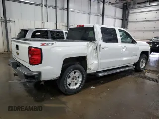 2014 Chevrolet Silverado 1500 LT with VIN 3GCUKREC0EG294862, listed as a Copart auction lot 57144794 with 115,009 mi miles and Salvage Title. Bid and sale history available at DreamBid. Image 3.