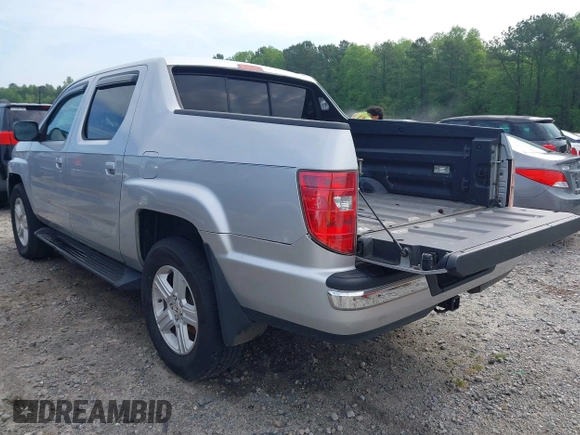 2009 Honda Ridgeline RTL with VIN 2HJYK16539H500986, listed as a IAAI auction lot 42084176 with 161,142 mi miles and . Bid and sale history available at DreamBid. Image 3.