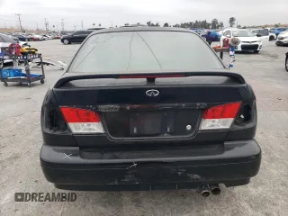 2002 Infiniti G20 Luxury z VIN JNKCP11A52T509703, wystawiony jako Copart lot #56278004 z przebiegiem 222 049 mil mil oraz Szkody całkowita. Historia ofert i sprzedaży dostępna na DreamBid. Obrazek 6.