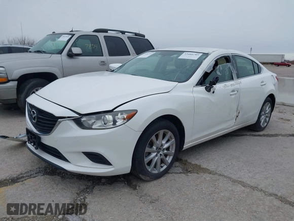 2015 Mazda Mazda6 i Sport with VIN JM1GJ1U68F1170884, listed as a IAAI auction lot 39229424 with 99,317 mi miles. Bid and sale history available at carsss.com. Image 2.