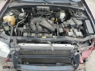 2005 Ford Escape XLT with VIN 1FMYU93105KD73059, listed as a Copart auction lot 53149615 with 143,739 mi miles and Salvage Title. Bid and sale history available at carsss.com. Image 12.