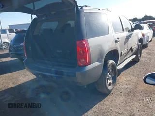 2012 GMC Yukon SLE with VIN 1GKS1AE06CR218372, listed as a IAAI auction lot 41591288 with 166,596 mi miles. Bid and sale history available at carsss.com. Image 4.
