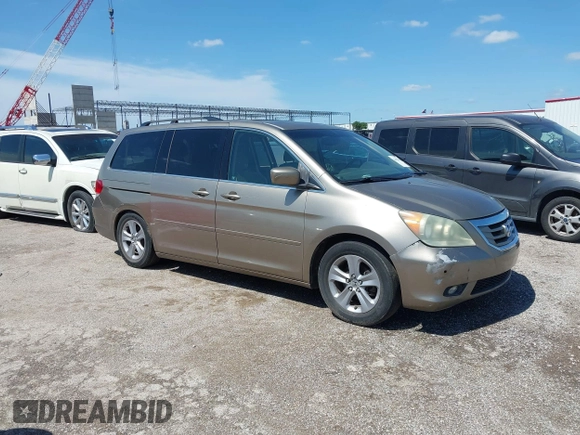 2010 Honda Odyssey Touring с VIN 5FNRL3H93AB069531, выставлен на аукционе IAAI как лот 42462835 с пробегом 241 297 миль миль и . История ставок и продаж доступна на DreamBid. Изображение 1.