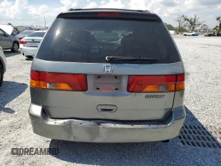 2002 Honda Odyssey EX-L with VIN 2HKRL18962H552809, listed as a Copart auction lot 63631115 with 224,019 mi miles and Salvage title. Bid and sale history available at DreamBid. Image 6.