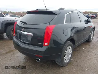 2014 Cadillac SRX Luxury Collection with VIN 3GYFNBE31ES591962, listed as a IAAI auction lot 41948735 with 97,523 mi miles and . Bid and sale history available at carsss.com. Image 4.