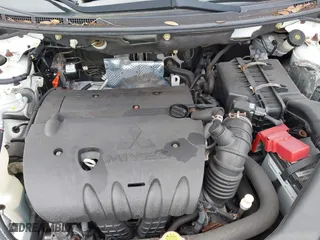 2012 Mitsubishi Lancer ES with VIN JA32U2FU5CU029556, listed as a IAAI auction lot 42104297 with 111,821 mi miles. Bid and sale history available at carsss.com. Image 10.
