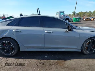 2023 Kia K5 GT-Line z VIN 5XXG64J28PG188506, wystawiony jako IAAI lot #41854184 z przebiegiem 18 967 mil mil oraz . Historia ofert i sprzedaży dostępna na DreamBid. Obrazek 13.