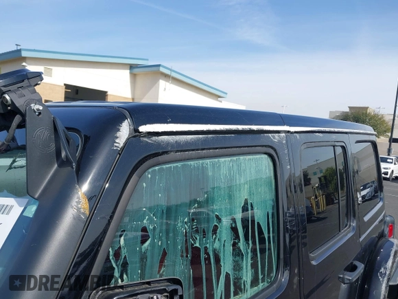 2022 Jeep Wrangler Unlimited Rubicon with VIN 1C4HJXFN0NW242903, listed as a IAAI auction lot 41448636 with 28,007 mi miles and . Bid and sale history available at DreamBid. Image 15.