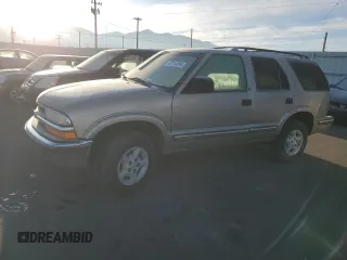 2001 Chevrolet Blazer LS z VIN 1GNDT13WX1K263690, wystawiony jako Copart lot #51698655 z przebiegiem 243 310 mil mil oraz Szkoda całkowita • Salvage title. Historia ofert i sprzedaży dostępna na DreamBid. Obrazek 1.