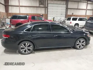 2021 Volkswagen Passat SE z VIN 1VWSA7A39MC001401, wystawiony jako IAAI lot #42019308 z przebiegiem 82 203 mil mil oraz . Historia ofert i sprzedaży dostępna na DreamBid. Obrazek 13.