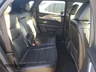 2022 Cadillac XT5 FWD Luxury z VIN 1GYKNAR49NZ159814, wystawiony jako Copart lot #74506584 z przebiegiem 7 069 mil mil oraz Nie do naprawy • Non repairable. Historia ofert i sprzedaży dostępna na DreamBid. Obrazek 11.