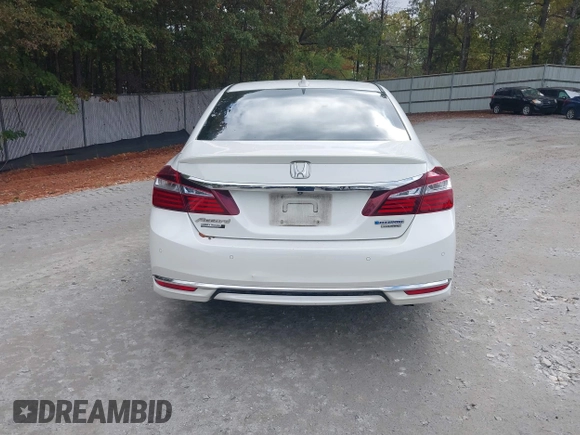 2017 Honda Accord Touring with VIN JHMCR6F73HC004661, listed as a IAAI auction lot 40806581 with 111,692 mi miles and . Bid and sale history available at DreamBid. Image 16.