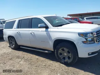 2019 Chevrolet Suburban LT with VIN 1GNSKHKC2KR297254, listed as a IAAI auction lot 41765492 with 63,058 mi miles. Bid and sale history available at carsss.com. Image 13.