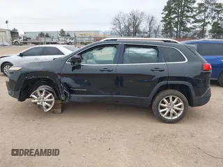 2014 Jeep Cherokee Limited with VIN 1C4PJLDSXEW279356, listed as a IAAI auction lot 41533158 with 115,117 mi miles. Bid and sale history available at carsss.com. Image 15.