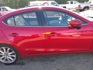 2015 Mazda 3 S Grand Touring z VIN JM1BM1W36F1253699, wystawiony jako IAAI lot #42204557 z przebiegiem 132 626 mil mil oraz . Historia ofert i sprzedaży dostępna na DreamBid. Obrazek 14.