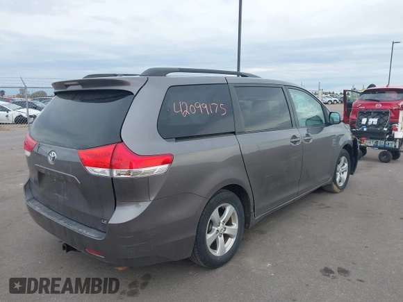 2011 Toyota Sienna LE AAS with VIN 5TDKK3DC3BS077857, listed as a IAAI auction lot 42099175 with 283,777 mi miles and . Bid and sale history available at DreamBid. Image 4.