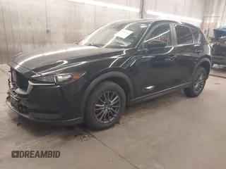 2020 Mazda CX-5 Touring with VIN JM3KFBCM9L1785125, listed as a IAAI auction lot 41983561 with 101,062 mi miles and . Bid and sale history available at carsss.com. Image 2.