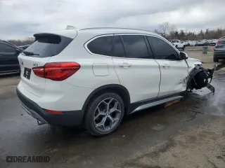 2017 BMW X1 xDrive28i with VIN WBXHT3C31H5F85452, listed as a Copart auction lot 50351125 with 61,954 mi miles and Salvage Title. Bid and sale history available at carsss.com. Image 3.