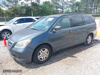 2006 Honda Odyssey EX-L with VIN 5FNRL38716B083630, listed as a IAAI auction lot 42017538 with 297,592 mi miles. Bid and sale history available at carsss.com. Image 2.