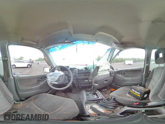 2002 Chevrolet Tracker ZR2 с VIN 2CNBJ734726925605, выставлен на аукционе Copart как лот 60070915 с пробегом Не указан миль и Списание • Salvage title. История ставок и продаж доступна на DreamBid. Изображение 14.