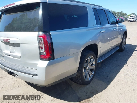 2015 GMC Yukon XL SLT with VIN 1GKS1HKC8FR221608, listed as a IAAI auction lot 42044318 with 215,757 mi miles. Bid and sale history available at carsss.com. Image 4.