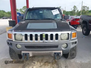 2006 Hummer H3 with VIN 5GTDN136468172236, listed as a IAAI auction lot 41971093 with 219,433 mi miles. Bid and sale history available at carsss.com. Image 6.